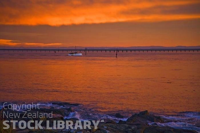 Bluff;Southland;Going Fishing;pier;long pier;fishing boat;orange sky;dawn sky