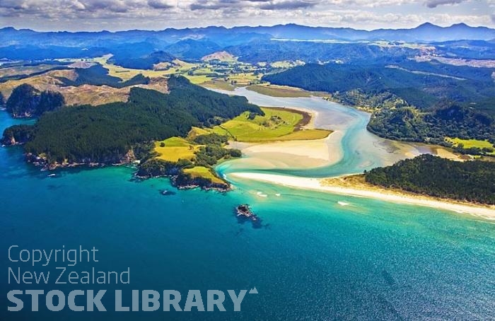 Aerial;Coromandel Coastline;Coromandel;sandy beaches;bachs;holiday homes;blue sky;blue sea;bush;native forrest;River;boating;bluffs;cliffs;islands;river estury;estury;boating;boats;yachts;speed boats;harbour;green;sea;cumulus clouds;Opoutere