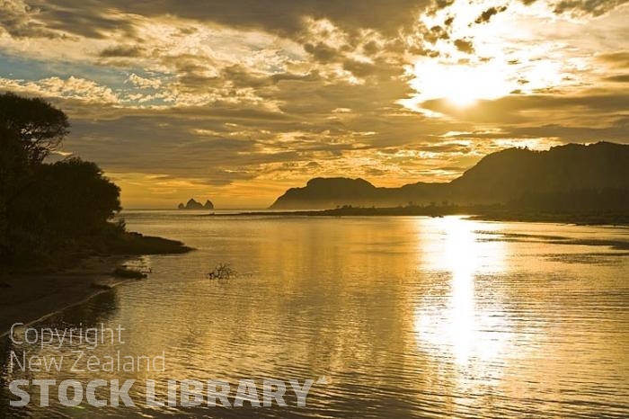 Tolaga Bay;Eastland;bush;native forrest;golden sands;bluffs;Uawa River;cliffs;wharf;sandy beaches;sand dunes;wharf;Uawa River Mouth;golden light;islands