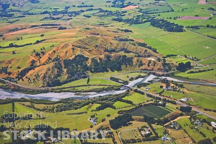 Aerial;Masterton;Wairarapa;native forest;Ruamahanga River;Scenic flights;Aircraft museum;airfield;Hood Aerodrome;sheep;sheep shearing;golden shears competion;Waingawa River;Trout Fishing;Tararua Ranges;agricultural centre;tramping tracks;green fields;River;bridge;Aratoi Museum of Art;Queen Elizabeth Park;The Vintage Aviator Museum;New Zealand photography