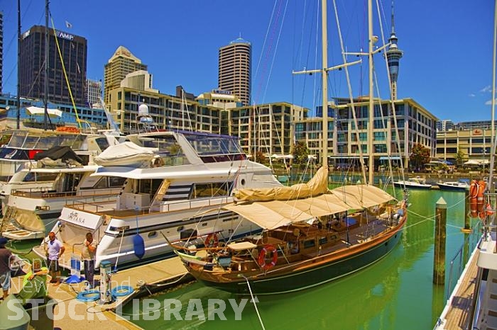 Auckland Central;Auckland Harbour;ticket office;waitemata Harbour;down town;docks;high rise buildings;ferries;boats;yachts;sky tower;yacht basin;motor yachts