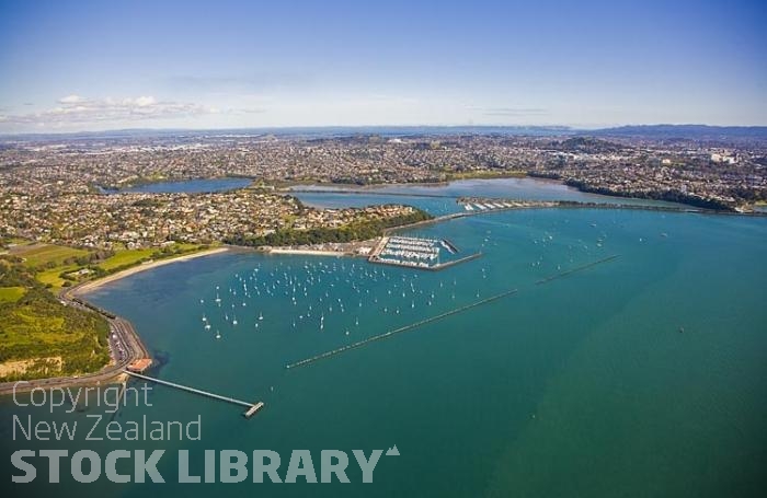 Oraki Marina;Oraki;Auckland East;Auckland;Tamaki Strait;crowds;sunbathers;Yachting;kayaking;Harbourfishing;fishing;boating;speed boating;blue sky;blue sea;Beach;sandy beach;homes;swimming;New Zealand photography