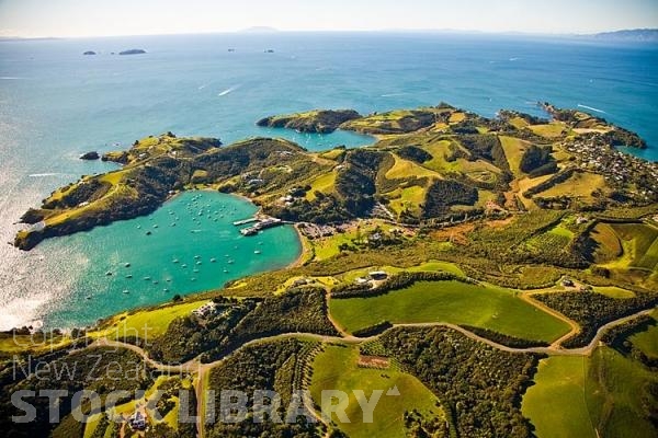 Aerial;Waiheke Island;Oneroa;Ostend;Omiha;OnetangiBeach;Onetangi;Palm Beach;vineyard;vineyards;Ferry;ferries;Tamaki Strait;Yachting;kayaking;Harbourfishing;fishing;boating;speed boating;blue sky;blue sea;Beach;sandy beach;homes;bach;bachs;swimming;bush;native forest;tramping tracks;New Zealand photography