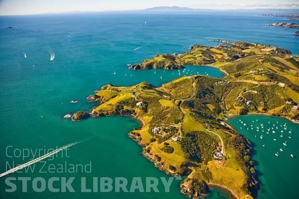 Aerial;Waiheke Island;Oneroa;Ostend;Omiha;OnetangiBeach;Onetangi;Palm Beach;vineyard;vineyards;Ferry;ferries;Tamaki Strait;Yachting;kayaking;Harbourfishing;fishing;boating;speed boating;blue sky;blue sea;Beach;sandy beach;homes;bach;bachs;swimming;bush;native forest;tramping tracks;New Zealand photography