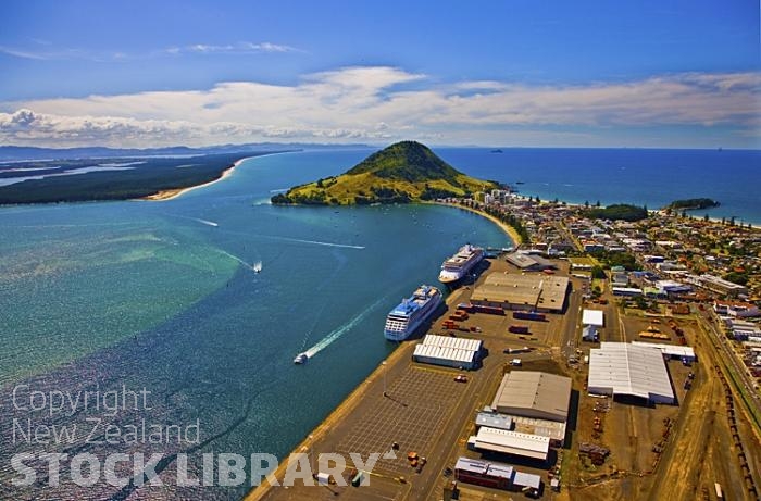 Aerial;The Port of Tauranga;Mount Maunganui;Bay of plenty;blue seablue skysandy beaches;sea;sea fishing;harbour;bachs;holiday homes;sand dunes;high rise buildings;cruise ships;tourists;holiday makers