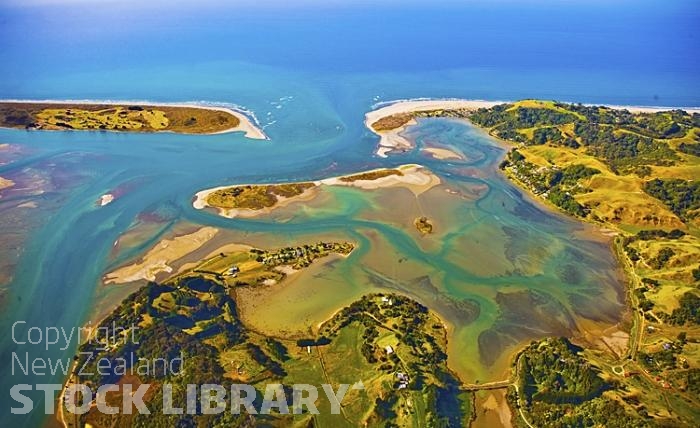 Aerial;Ohope Beach and Ohiwa Harbour;Bay of plenty;blue sea;blue sky;sandy beaches;sea;sea fishing;harbour;bachs;holiday homes;sand dunes;tourists;holiday makers;swimming