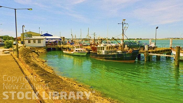 Tauranga;Bay of plenty;blue sea;blue sky;sandy beaches;sea;sea fishing;harbour;tourists;holiday makers;swimming;Fishing;ferry;dinghies;al fresco eating;al fresco eating;out door eating;bridge;church;cruise ships;harbours;high rise;high rise buildings;restaurants;Fishing Vessels