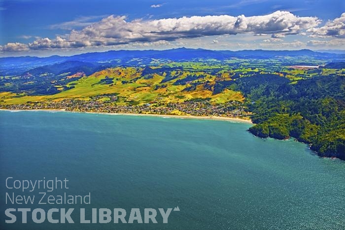 Aerial;Waihi Beach;Bay of plenty;kiwi fruit orchards;kiwi fruit;kiwi fruit growing;agriculture;agricultural centre;sandy beaches;sand dunes;bachs;holiday homes;blue sky;blue sea;bush;native forrest