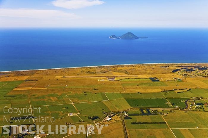 Aerial;Whakatane;Bay of plenty;Whakatane River'kiwi fruit orchards;kiwi fruit;kiwi fruit growing;agriculture;agricultural centre;arable farming;sandy beaches;sand dunes;bachs;holiday homes;blue sky;blue sea;bush;native forrest;River;harbour entrance;harbour;waka;airport