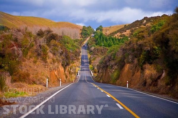 Taupo;Trout Fishing;South Waikato;Lake Taupo;Waikato river;jet boating;tourists;visitor centre;boat harbour;marina;yacht;yachts;launch;launches;holiday homes.baches;Autumn Colours;Typical Terrain of the west side of the lake;road;road straight;road hilly;road