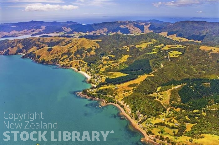 Aerial;Coromandel Coastline;Coromandel;sandy beaches;bachs;holiday homes;blue sky;blue sea;bush;native forrest;River;boating;bluffs;cliffs;islands;river estury;estury;boating;boats;yachts;speed boats;harbour;green;sea;cumulus clouds;Amodeo Bay