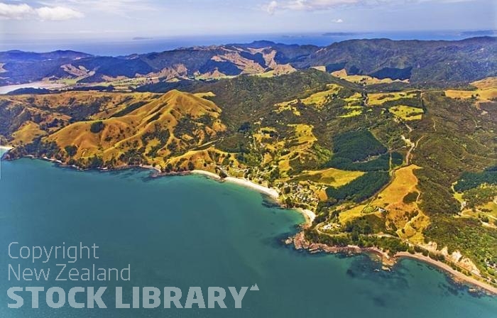 Aerial;Coromandel Coastline;Coromandel;sandy beaches;bachs;holiday homes;blue sky;blue sea;bush;native forrest;River;boating;bluffs;cliffs;islands;river estury;estury;boating;boats;yachts;speed boats;harbour;green;sea;cumulus clouds;Amodeo Bay