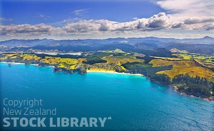 Aerial;Coromandel Coastline;Coromandel;sandy beaches;bachs;holiday homes;blue sky;blue sea;bush;native forrest;River;boating;bluffs;cliffs;islands;river estury;estury;boating;boats;yachts;speed boats;harbour;green;sea;cumulus clouds;Onemana;Whangamata;Onemana