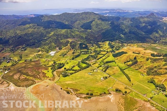 Aerial;Coromandel;sandy beaches;sand dunes;bachs;holiday homes;blue sky;blue sea;bush;native forrest;River;harbour entrance;harbour;waka;bluffs;cliffs;boating;Airfield