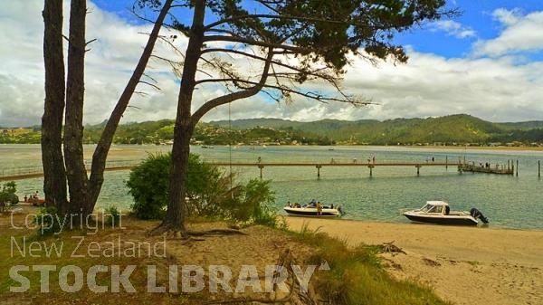 Pauanui;Coromandel;sandy beaches;bachs;holiday homes;blue sky;blue sea;bush;native forrest;River;boating;bluffs;cliffs;boats;kayaks;kayaking;ferry;jetty