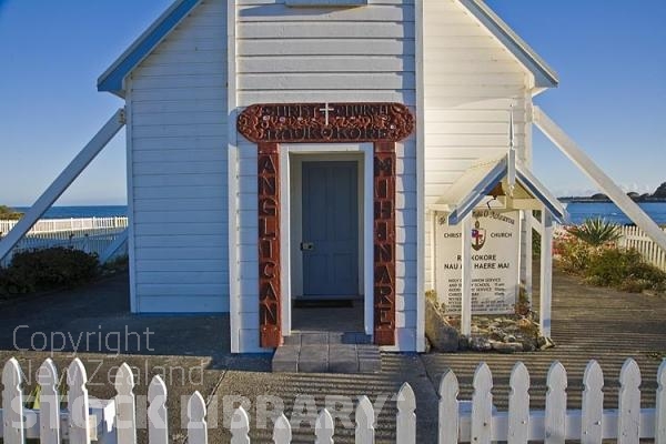 Raukokore;Anglican Church;church;bluffs;cliffs;rocky shorelines;sea fishing;Marai;Maori carving;Maori warrior;mountains;church entrance