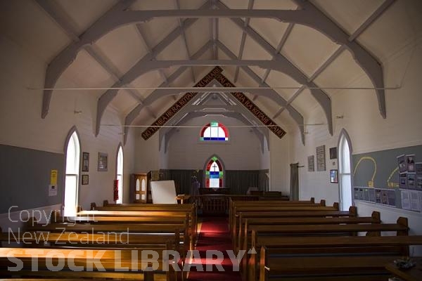 Raukokore;Anglican Church;Interior;church;bluffs;cliffs;rocky shorelines;sea fishing;Marai;Maori carving;bush;mountains;pews