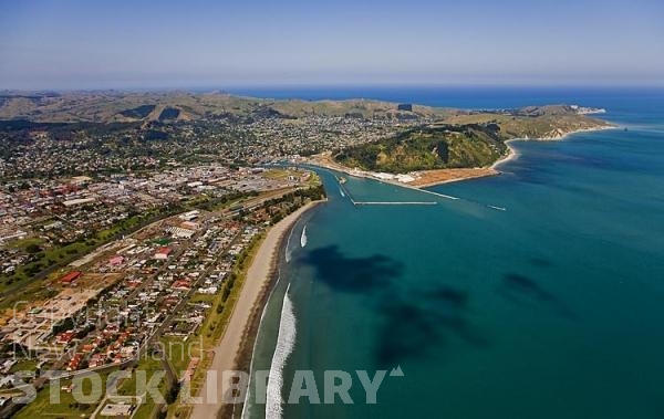 Aerial;Gisborne;Turanganui River;industrial buildings;suburburban;Hospital;bridge;Gardens;harbour;docks;Young Nick's Head;blue sky;blue sea;bluffs;cliffs;Airport