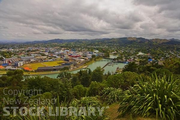 Gisborne;Turanganui River;industrial buildings;suburburban;Hospital;bridge;Gardens;harbour;docks;Young Nick's Head;blue sky;blue sea;bluffs;cliffs;Airport;palms;palm trees;The inner Harbour;Titirangi Park