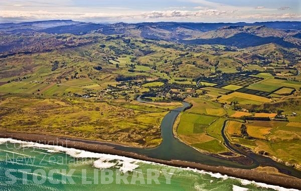 Aerial;Hawkes Bay Coast;bush;native forrest;golden sands;bluffs;River;cliffs;sandy beaches;vineyards;blue sky;blue sea;Nuhaka;river mouth