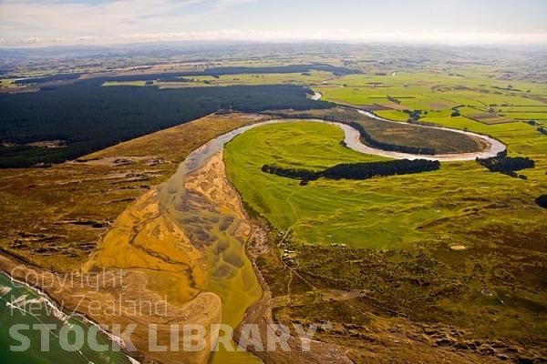 Aerial;Whangaehu River Mouth;Whanganuinative forest;sheep;sheep shearing;agricultural centre;agriculture;Fishing;angling;baches;white bating;tramping tracks;green fields;Tasman Sea;New Zealand photography