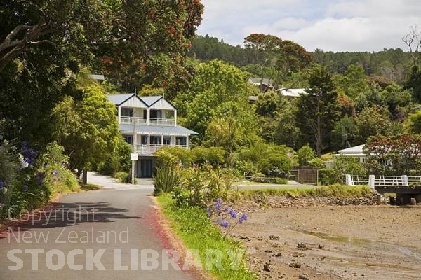 Mangonui;Northland;sandy beaches;bachs;holiday homes;bush;native forrest;golden sands;blue sky;blue sea;Pohutakawa trees;Mangonui Mill Bay