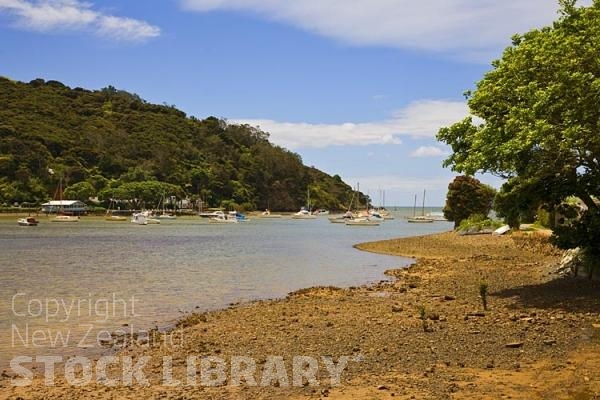 Mangonui;Northland;sandy beaches;bachs;holiday homes;bush;native forrest;golden sands;blue sky;blue sea;Pohutakawa trees;boats;boating;fishing;fishing boats;yachts;kayaks;Mangonui Mill Bay;Cruising Club