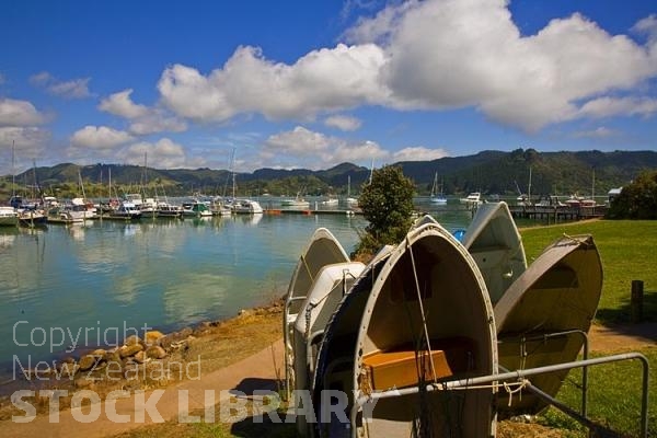 Whangaroa Harbour;Northland;bachs;holiday homes;bush;native forrest;blue sky;blue sea;Pohutakawa trees;boats boating;fishing;fishing boats yachts;kayaks;dinghies