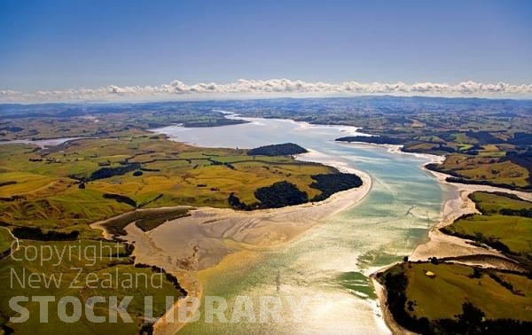 Aerial;Kaipara Harbour;Rodney;green fields;paddocks;Tasman Sea;blue sky;blue sea;Oruawharo River