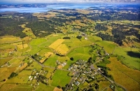 Aerial;Kaipara_Harbour;Rodney;green_fields;paddocks;Tasman_Sea;blue_sky;blue_sea