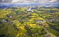 Aerial;Kaipara_Harbour;Rodney;green_fields;paddocks;Tasman_Sea;blue_sky;blue_sea