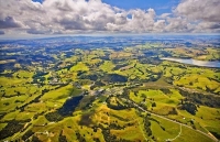 Aerial;Kaipara_Harbour;Rodney;green_fields;paddocks;Tasman_Sea;blue_sky;blue_sea