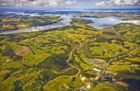 Aerial;Kaipara_Harbour;Rodney;green_fields;paddocks;Tasman_Sea;blue_sky;blue_sea