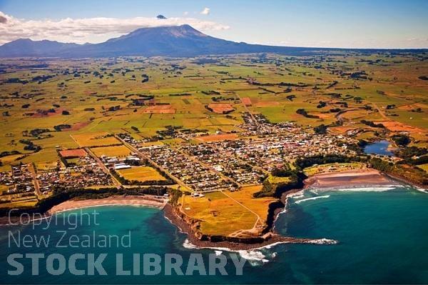 Aerial;Opunake;Taranaki;River;Rivers;bush;native forrest;green fields;green paddocks;landscape;Clear water;bluffs;cliffs;sandy beaches;bachs;holiday homes;Mount Taranaki;Mount Egmont;bays;sandy bays;golden sand;rocky shoreline