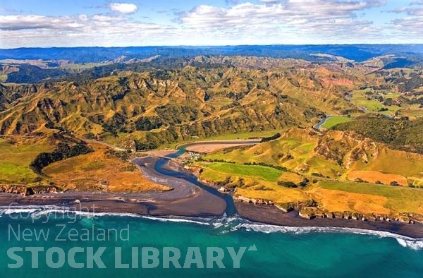 Aerial;West Coast Waikato;Waikato;coastal;bachs;holiday homes;bush;native forrest;blue sky;blue sea;boating;Fishing boats;bluffs;cliffs;golden sands;rocky shorelines;sandy beaches;sheep country;Tasman sea;Mohakatino River;Bridge;caves;state highway3;state highway three