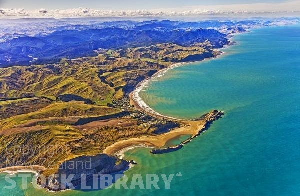 Aerial;Castle Point;Wairarapa;Blue sea;blue sky;cumulus clouds;rocky shorelines;sandy beaches;scenic beauty;golden sands;bluffs;cliffs;lighthouse;fishermen;anglers;rocky outcrops;fishing boats;beach launched boats