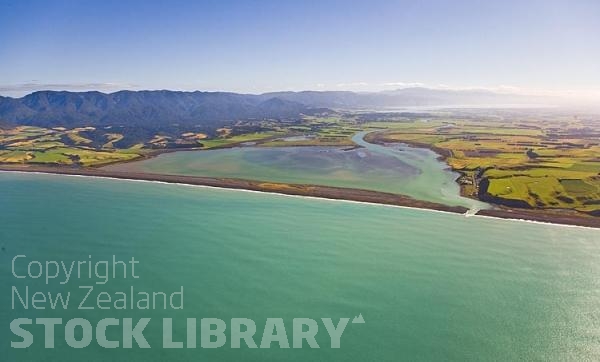 Aerial;Wairarapa Coast;Wairarapa;Blue sea;blue sky;cumulus clouds;rocky shorelines;sandy beaches;scenic beauty;golden sands;bluffs;cliffs;bush;native forrest;Lake Ferry;sand bar;bar;lake Wairarapa;Lake Onoke;river mouth;Raumahanga River;Rimutaka Range