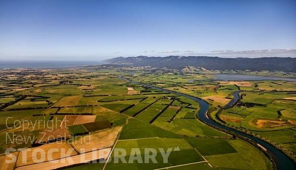 Aerial Image;Wairarapa Landscape Image;Wairarapa;Ruamahanga River;lake Wairarapa;Lake Ferry Image;Tararua Ranges Image;Palliser Bay Image;paddocks;green fields;New Zealand Images