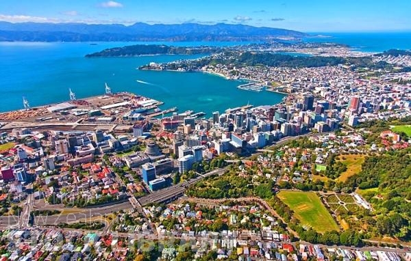 Aerial;Wellington;Beehive;parliament;down town;highrise;airport;bays;marina;docks;harbour;ferries;port;clear water;cranes;cafes;restaurants;motorway;traffic;boats;planes;aircraft;helicopters