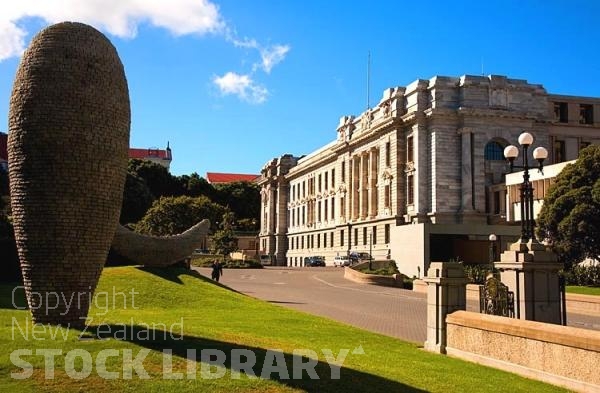 Wellington;Beehive;parliament;down town;highrise;airport;bays;marina;docks;harbour;ferries;port;clear water;cranes;cafes;restaurants;motorway;traffic;boats;planes;aircraft;helicopters;caketin;rugby stadium;railwat station;Parliament Building;sculptures;lamp posts