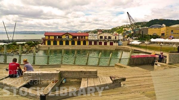 Wellington;Beehive;parliament;down town;highrise;airport;bays;marina;docks;harbour;ferries;port;clear water;cranes;cafes;restaurants;motorway;traffic;boats;planes;aircraft;helicopters;The Boatshed;public space