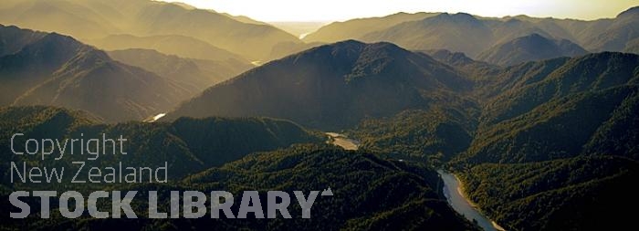 Aerial;Buller River Aerial image;Buller River Image;Native Bush image;mountain image;Buller Region;mountains;hills;rivers;Rail;railway;rail line;Road;State Highway 6;bush;native forrest;warm light