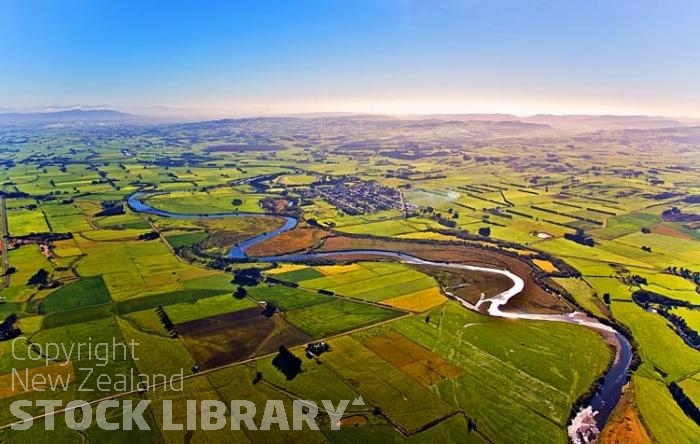 Aerial;Mataura;Southland;hills;rivers;state highway1;Dairy farm;dairy farming;green fields;green paddocks;Mataura river;sheep farming;sheep;Freezing works;abatoir;slaughter house;Wyndham