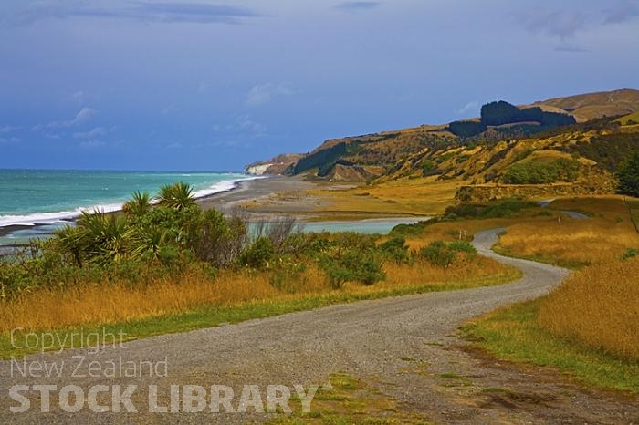 Hurunui River mouth;Hurunui;Alpine Pacific Triangle;Hurunui River mouth;Hurunui River;sand bar;beach;bush;native forest;tramping tracks;cabbage trees;cliffs;bluffs;bush;grey clouds