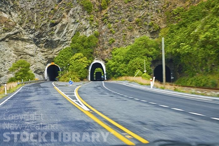 Triple;Tunnels South of Kaikoura;Hurunui;Alpine Pacific Triangle;coast road;tunnels;road tunnels;rail tunnels;Hurunui River;sand bar;beach;bush;native forest;tramping tracks;rocky shorelines;Road Signs;Triple;Tunnels;Kaikoura