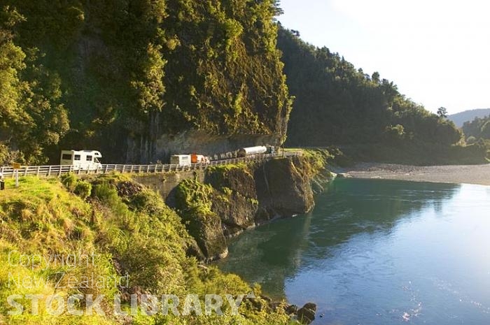 Buller Gorge;Buller River;Buller Region;mountains;hills;rivers;Rail;railway;rail line;Road;State Highway 6;bush;native forrest;traffic;transport vehicles.;River;Road;road overhang;half tunnel;camper van