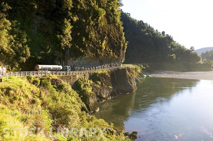 Buller River-Buller Region-Buller Gorge;Buller River;Buller Region;mountains;hills;rivers;Rail;railway;rail line;Road;State Highway 6;bush;native forrest;over hange;half tunnel;transport vehicles