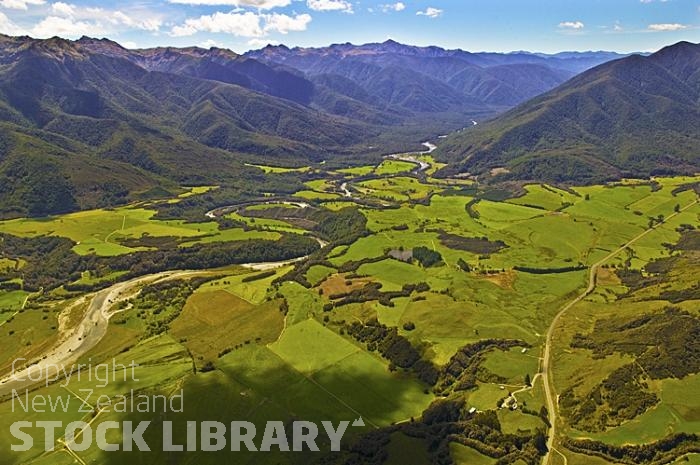 Aerial;Maruia River Valley;Buller Region;mountains;hills;rivers;line;Road;bush;native forrest;state highway65;Dairy farm;dairy farming;green fields;green paddocks;Victoria Range;Victoria Forest Park;Maruia River;bluffs;cliffs;waterfall;maruia falls;Maruia River Gorge