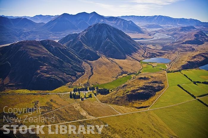 Aerial;Arthur's Pass Route Canterbury;mountains;hills;Lakes;Waimakariri River;tussock grass;tussock;rail lines;railway;freight trains;tourist trains;bush;native forrest;state highway 73;Cass Railway Station;Cass;Railway Station;Lake Sarah