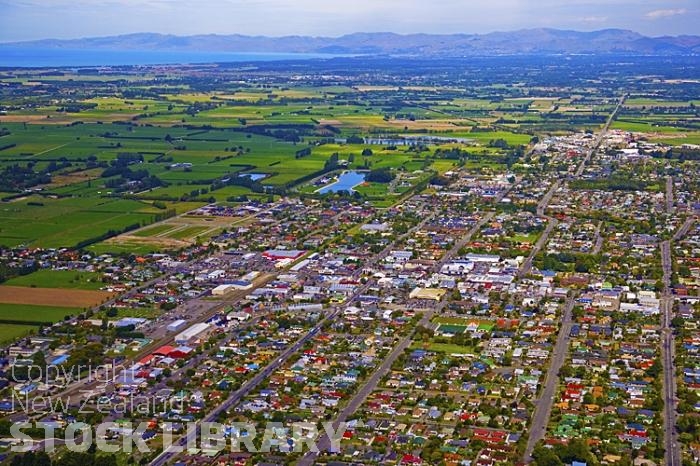 Aerial;Rangiora;Canterbury;Canterbury Plain;green fields;paddocks;green paddocks;rivers;Ashley;River;dairy farming;sheep;Down Town;Banks Peninsula;Christchurch